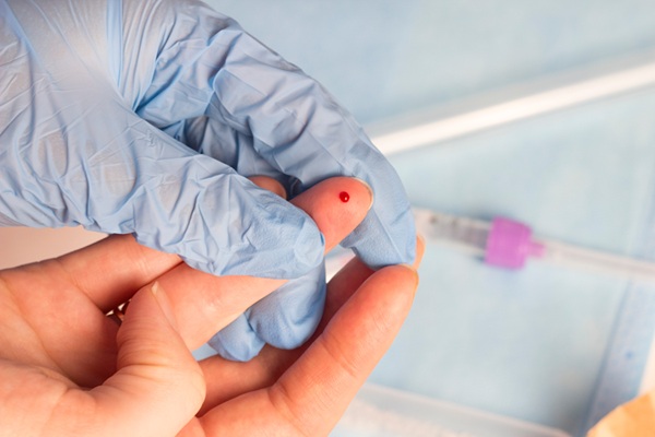 blood sampling from the finger, close up, finger and blood